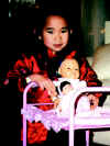 Liana_and_dolls.jpg (100141 bytes)